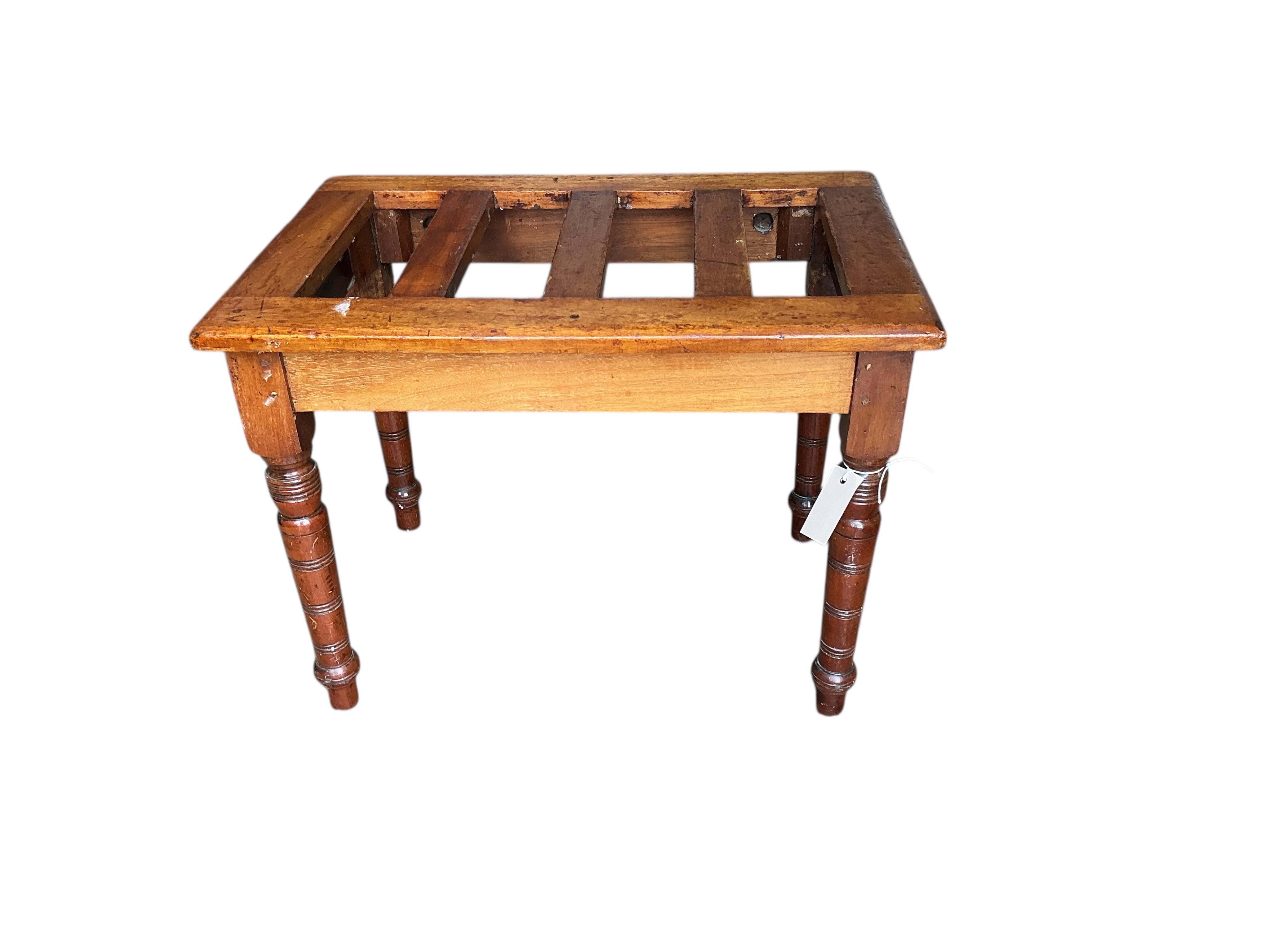 A late Victorian mahogany luggage stand, width 61cm, depth 41cm, height 46cm